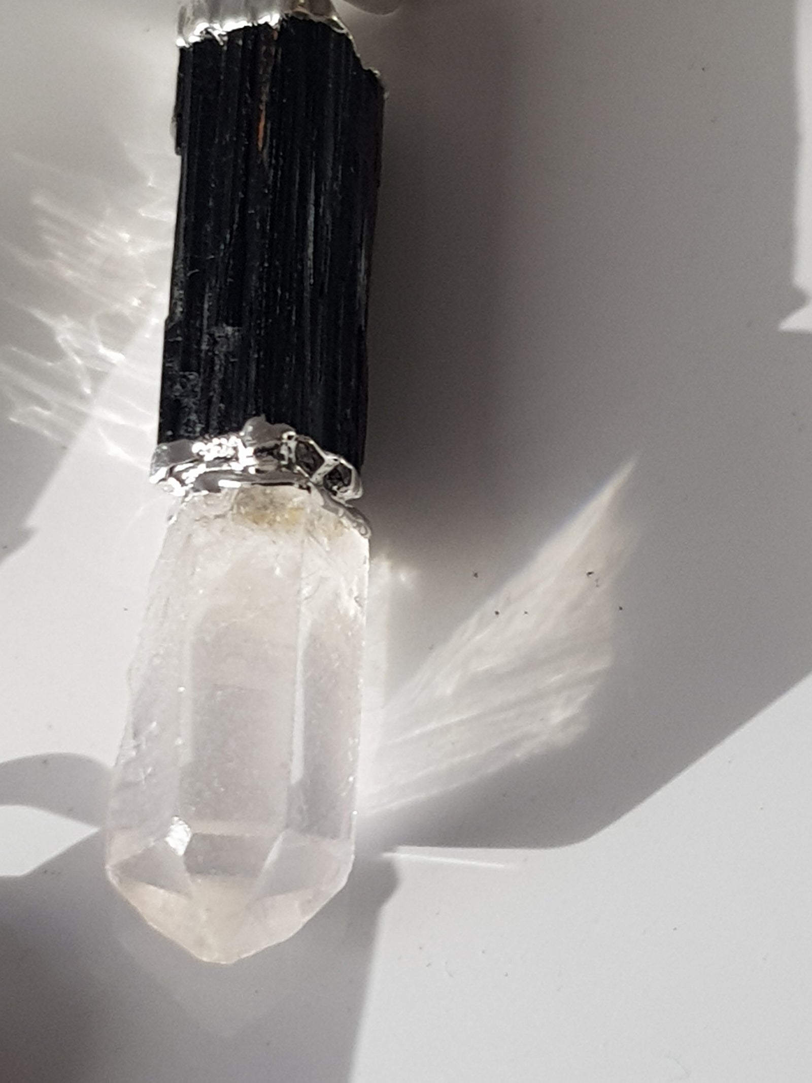 Quartz and tourmaline pendant - The Science of Magic 