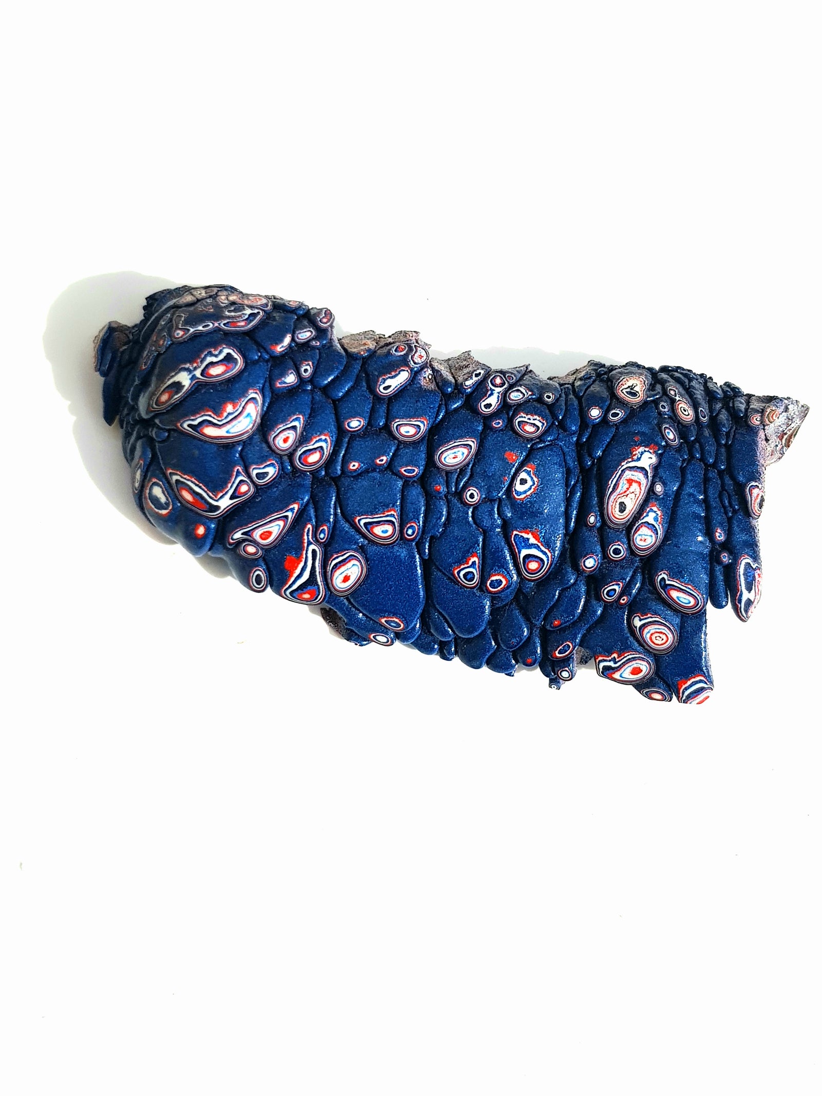 raw fordite - The Science of Magic 