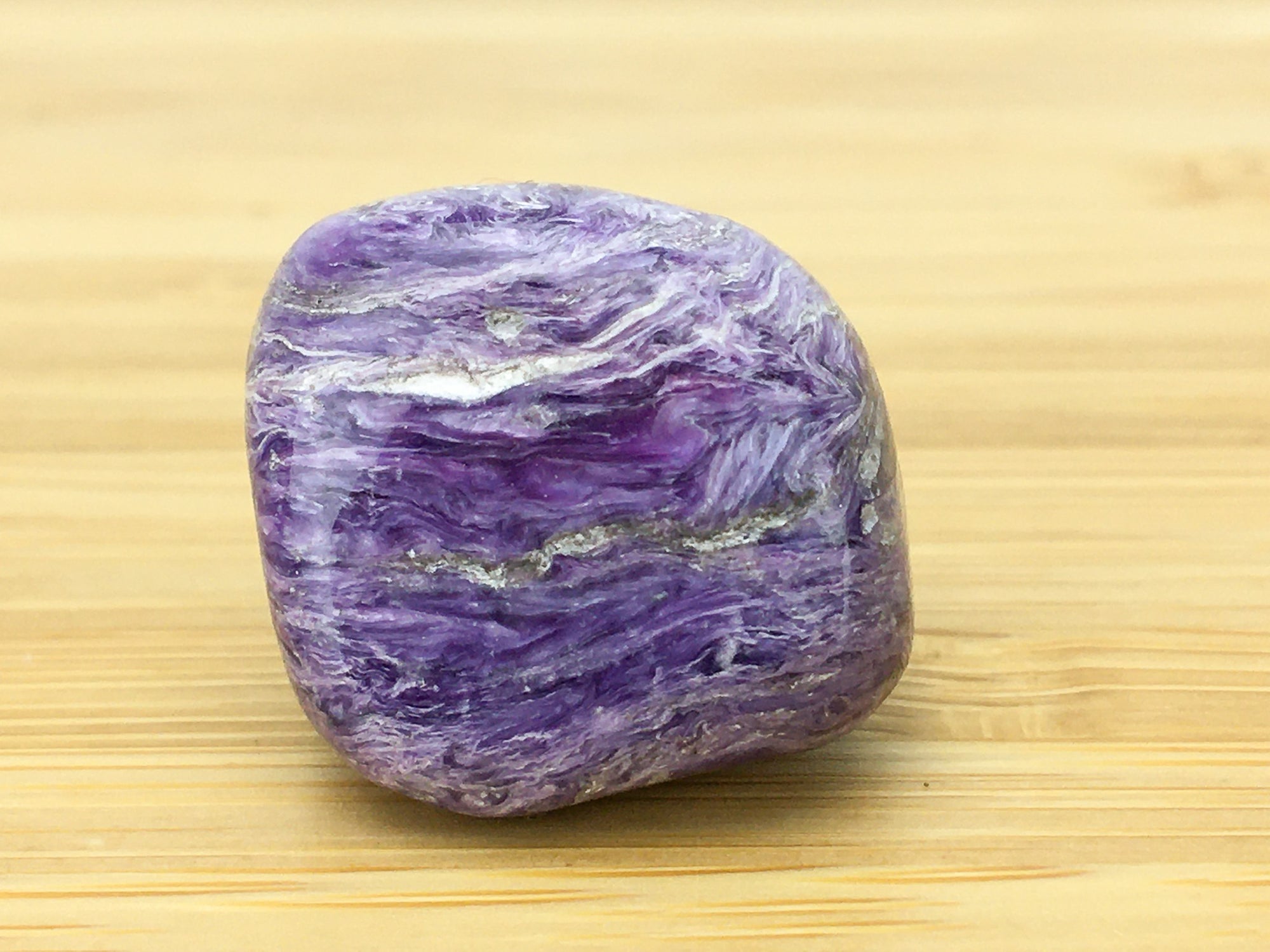 chariot tumble stone. shows distinctive purple and white banding