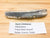 ice age fossil horse tooth -- Equus mexicanus. sample is shown next to printed label. Label says " Equus mexicanus, Pleistocene, trinity river gravel, Dallas county, Texas"