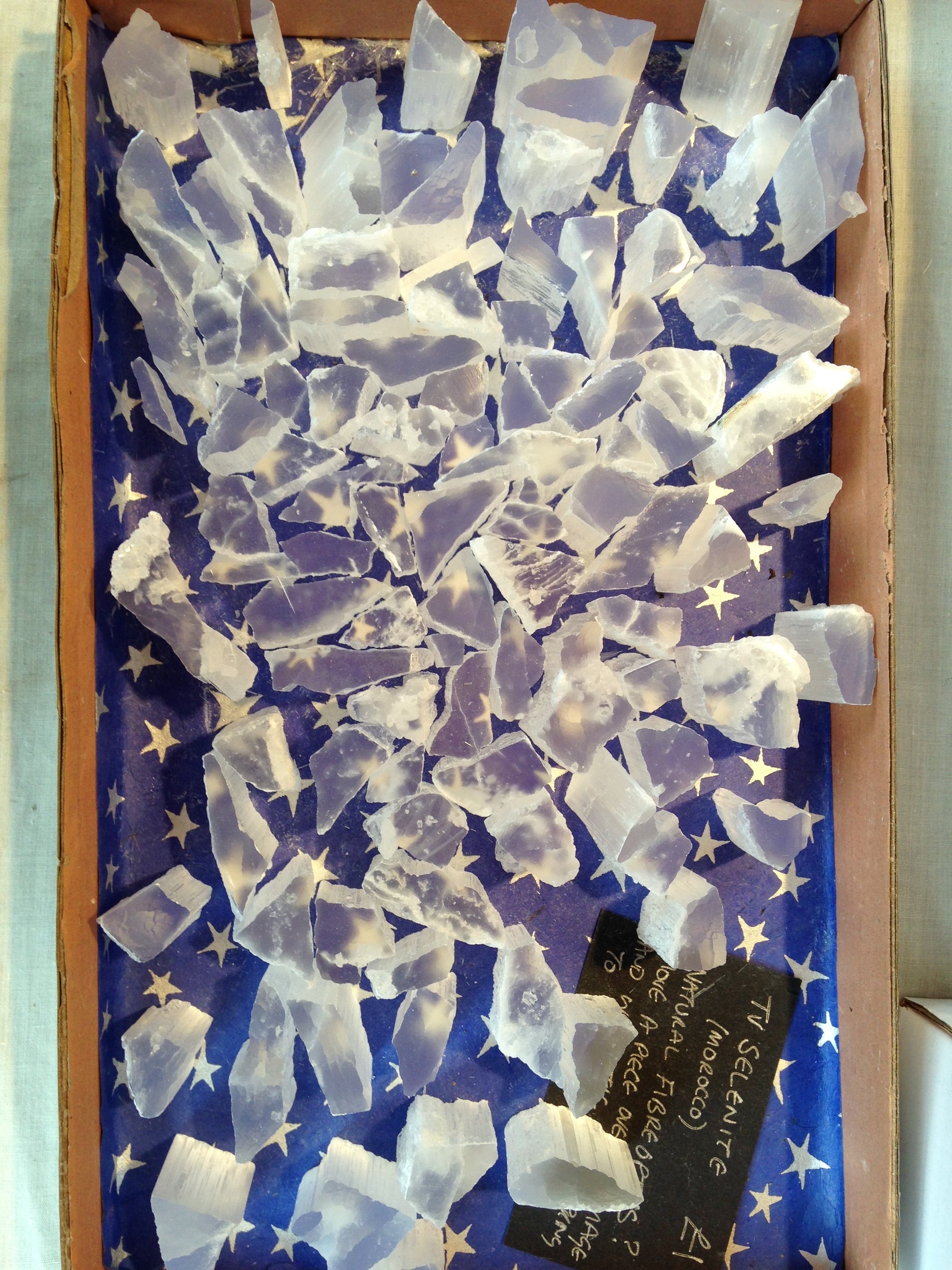 Pieces of TV selenite showing their fibre optic effect.