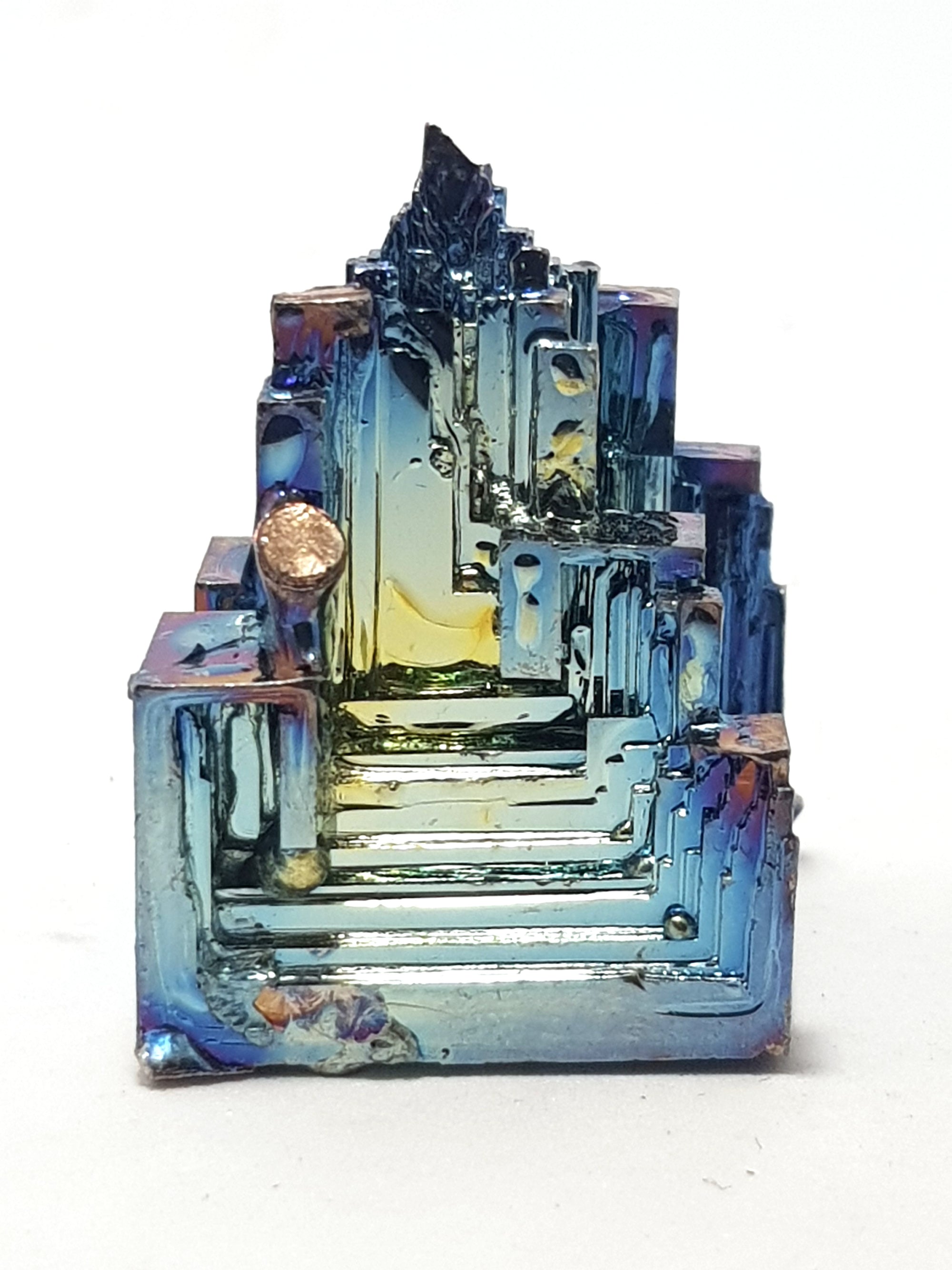 bismuth crystal. beautiful stepped effect. iridescent colours blue/gold