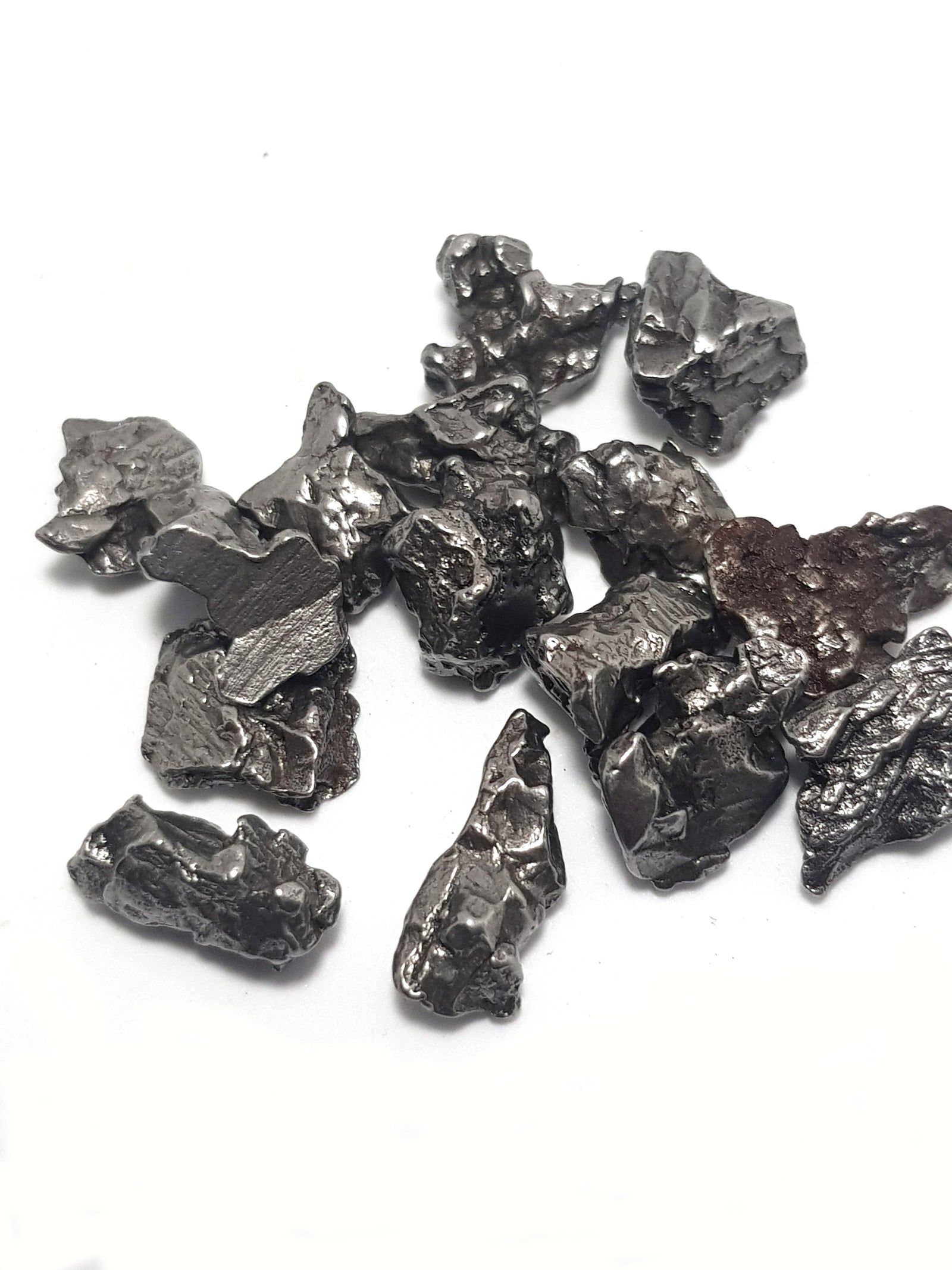 shrapnel fragments of campo del cielo. they have been cleaned by electrolysis and are very shiny