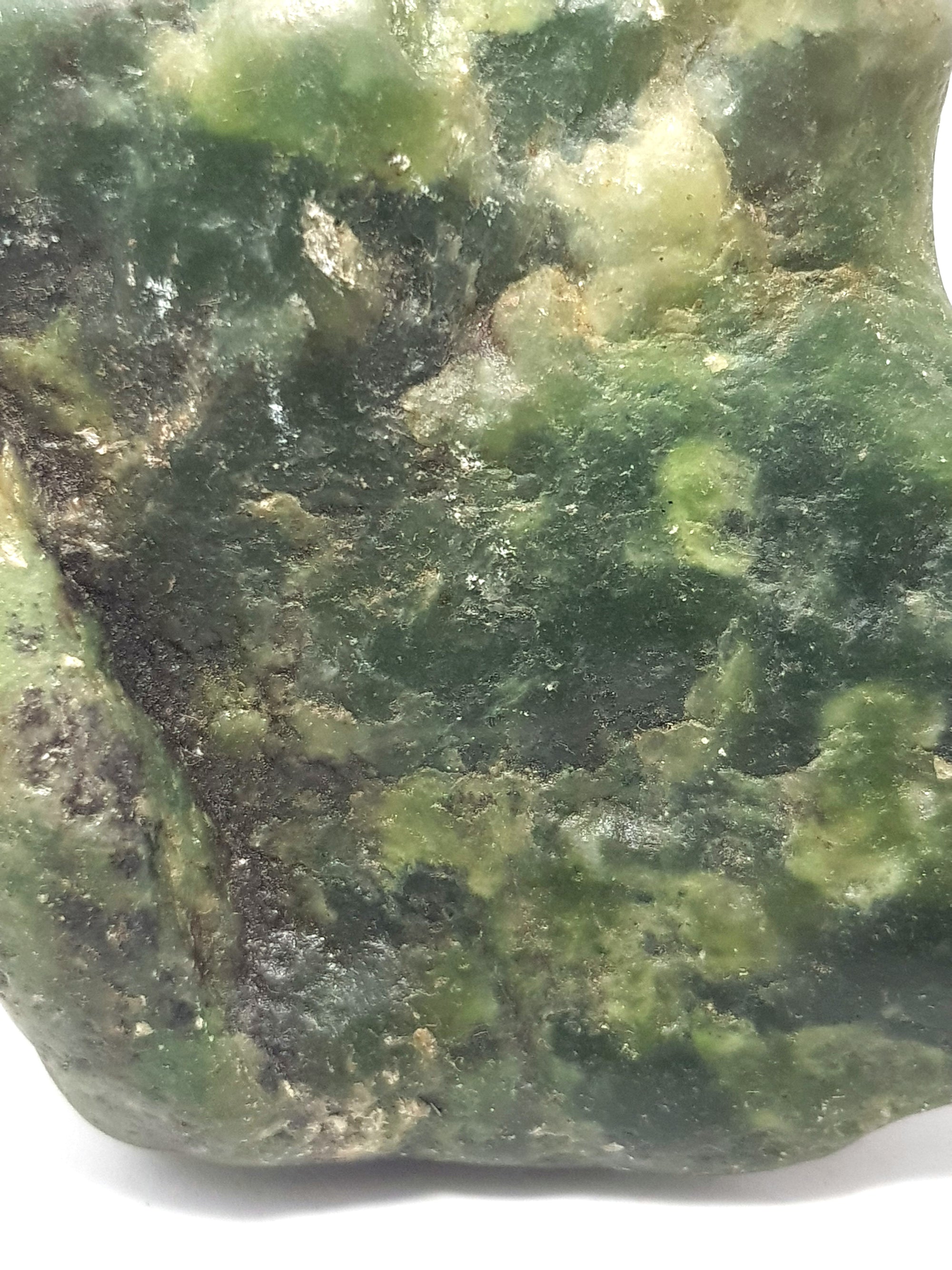 Semi polished green jade freeform