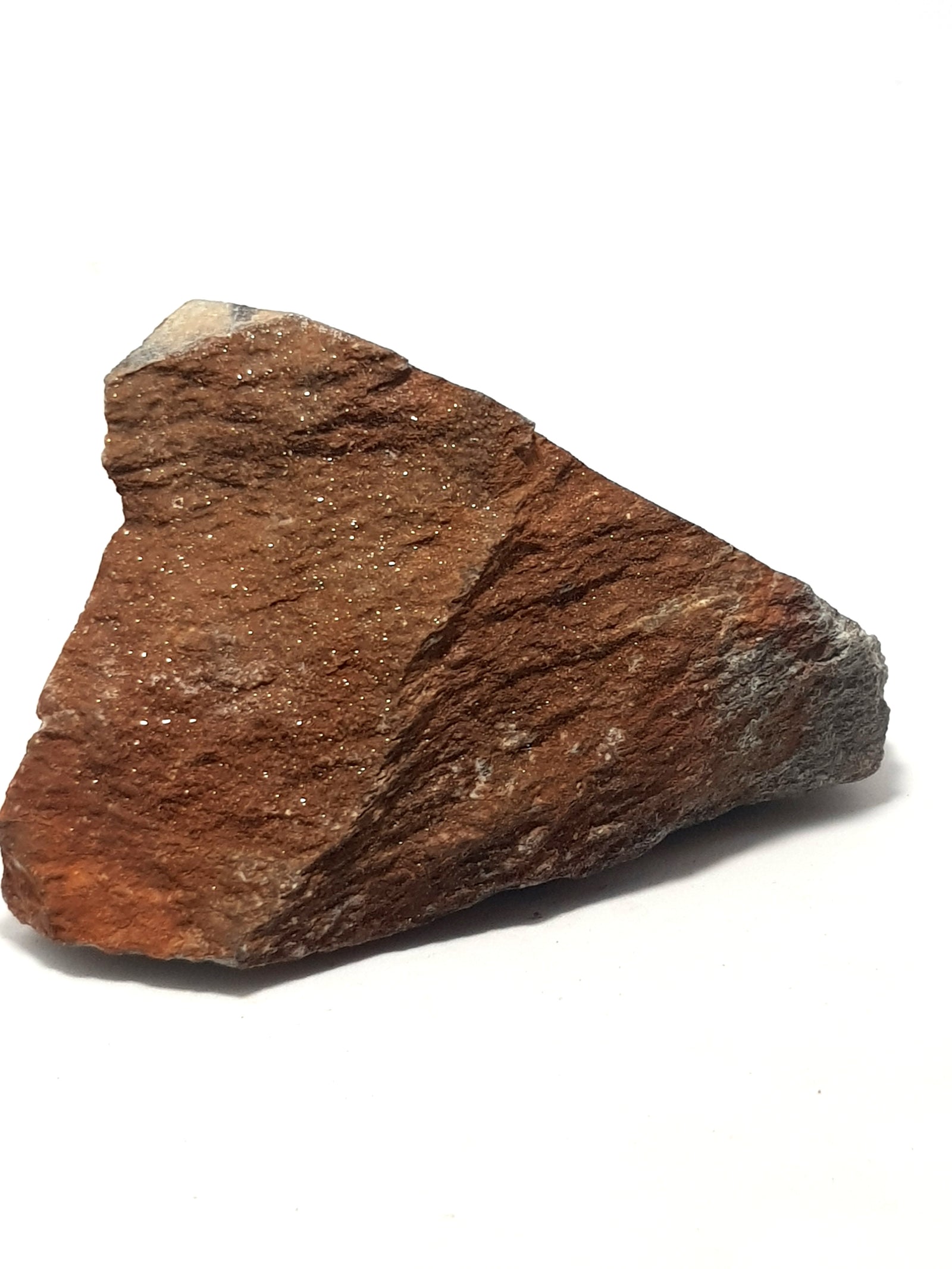 a sample of childrenite. it has a brown sparkly textured surface.