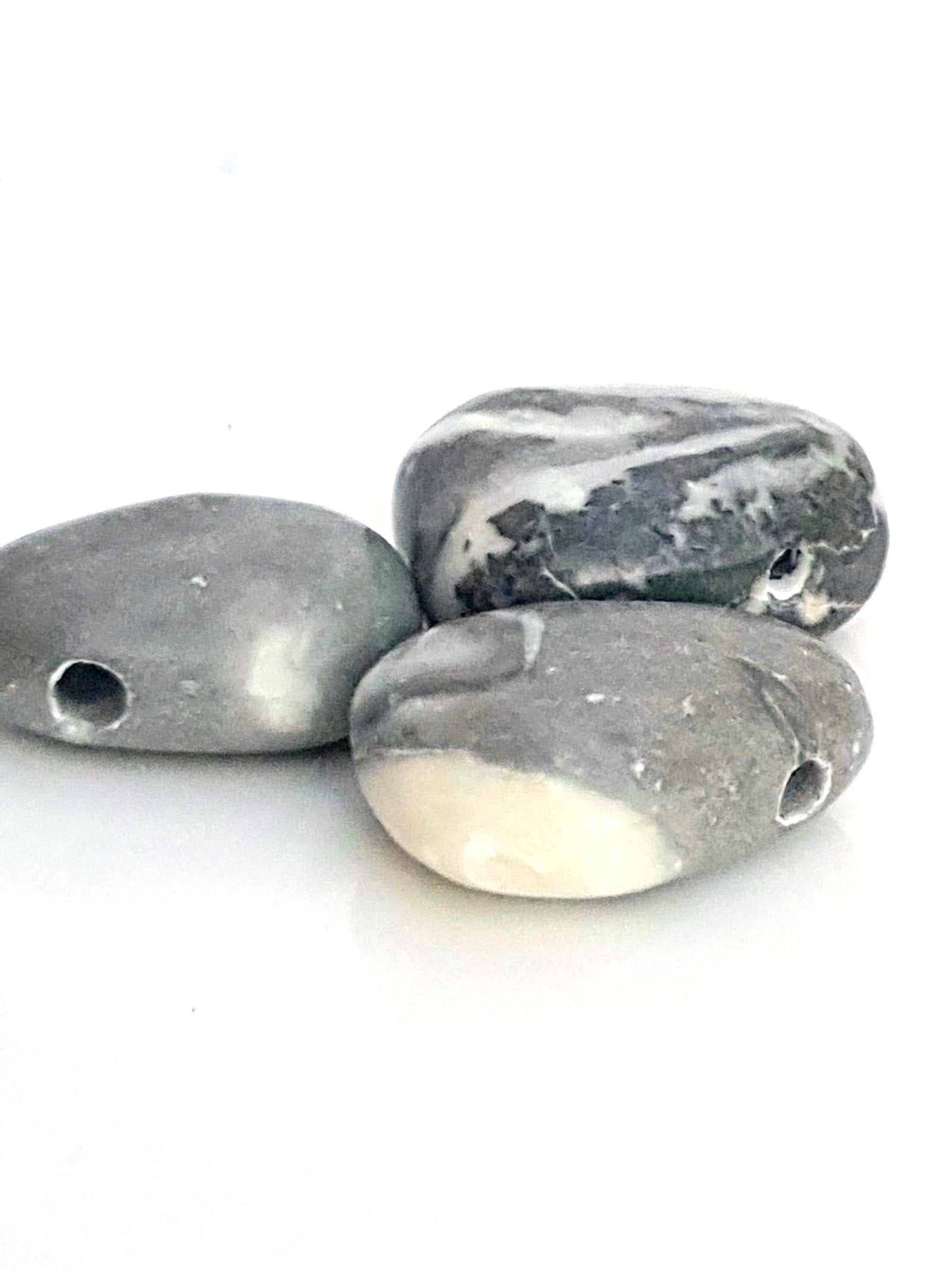 Bivalve drilled stone - The Science of Magic 