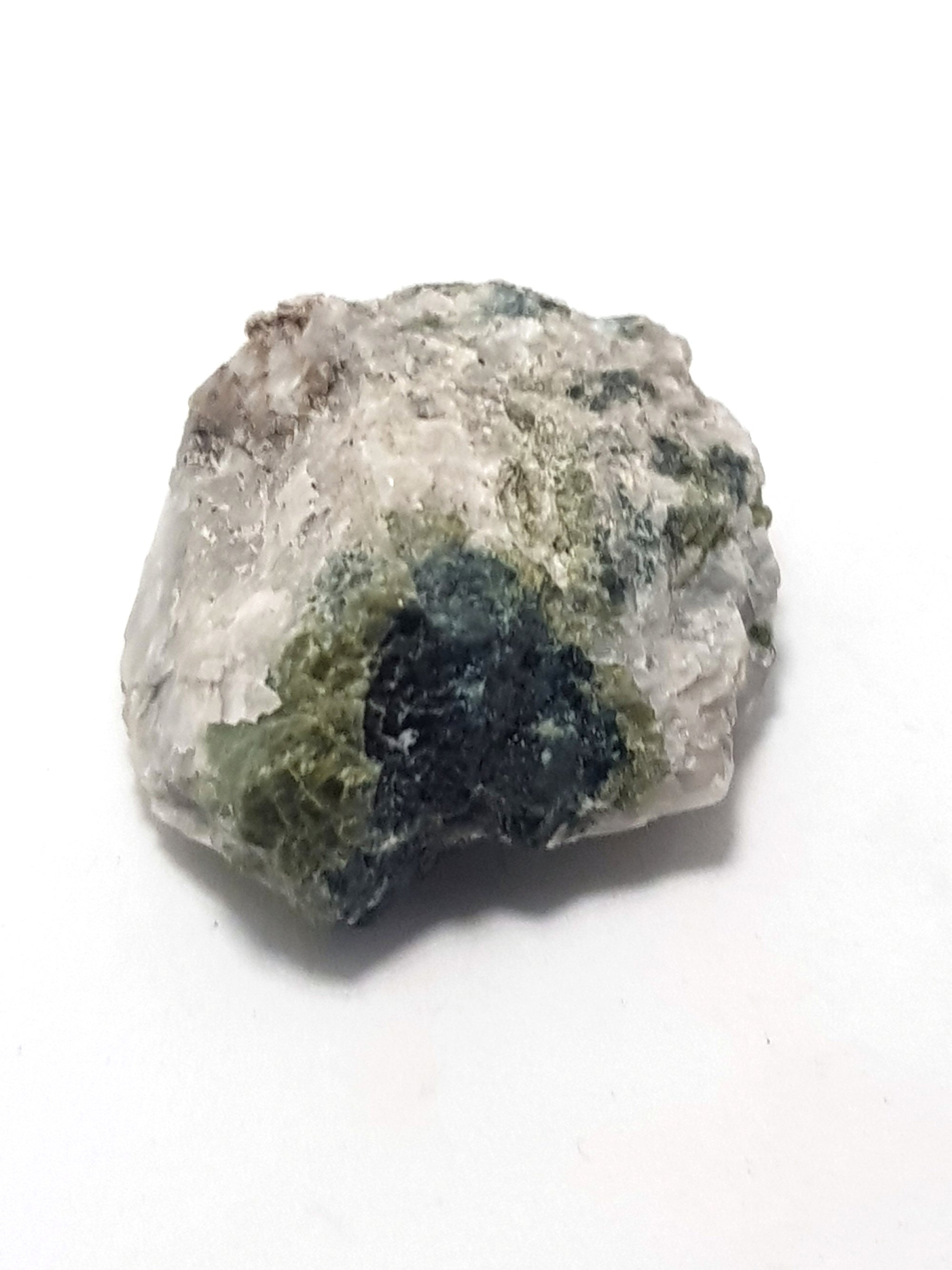 light and dark green tourmaline in plagioclase and quartz