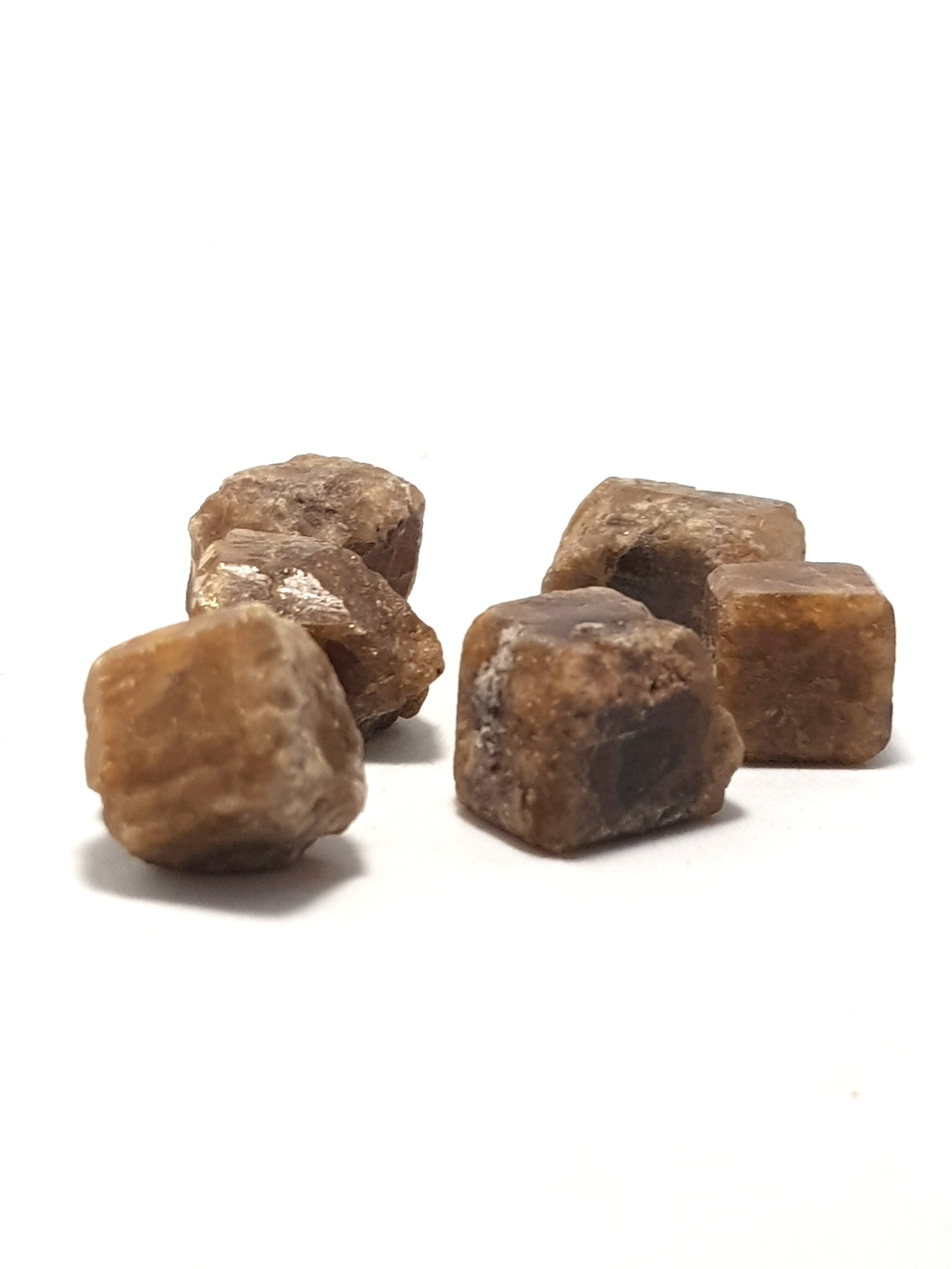 well formed vesuvianite crystals. They are olive coloured. they are not translucent.