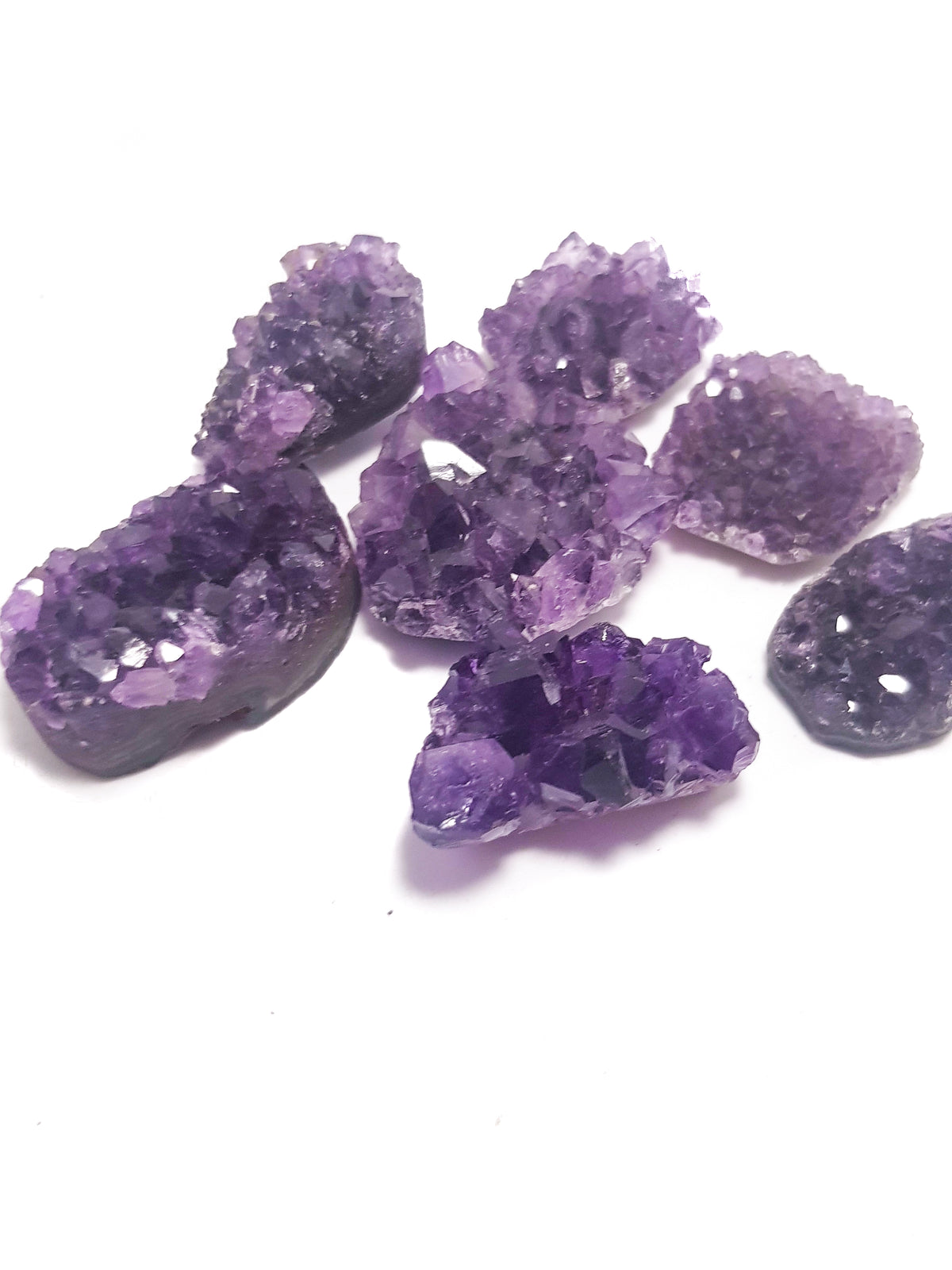 multiple small pieces (2.5 cm or less) of druzy amethyst