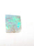 light opal rub. this has a bright blue opalescence, the pitch is light grey