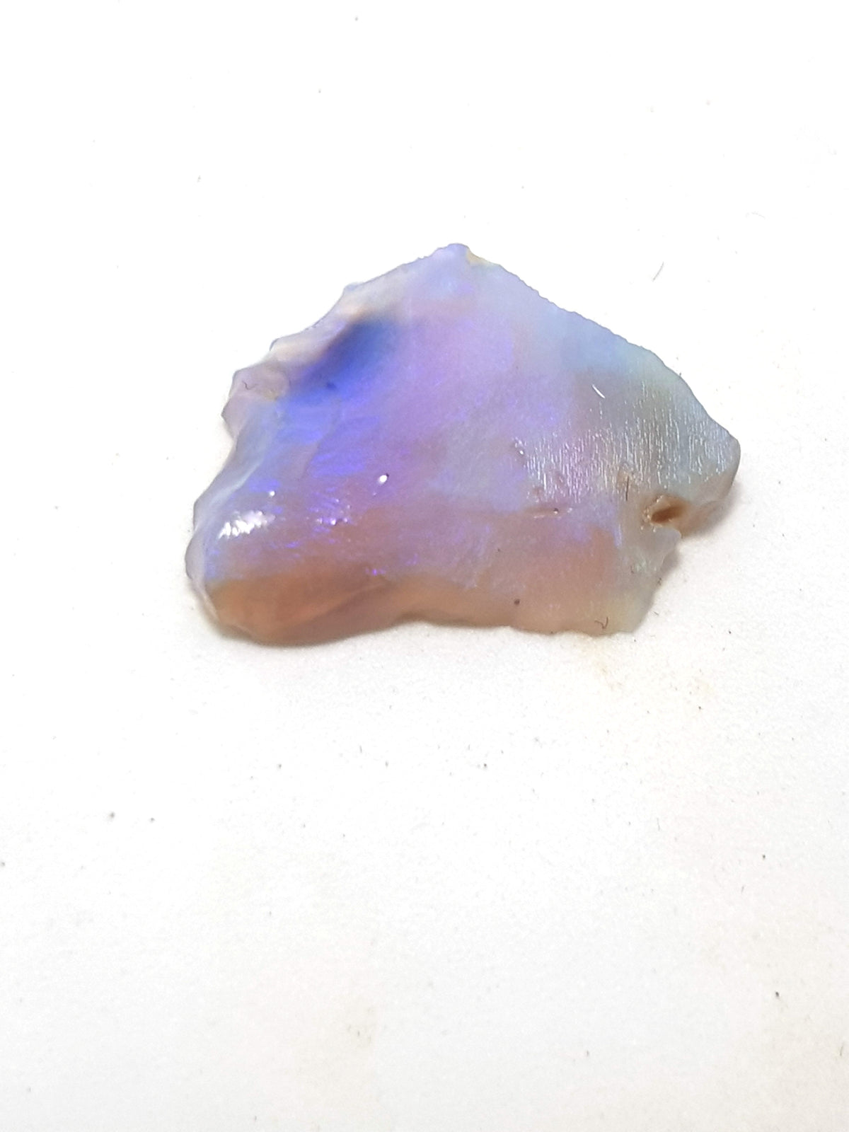 light blue fire opal. roughly shaped