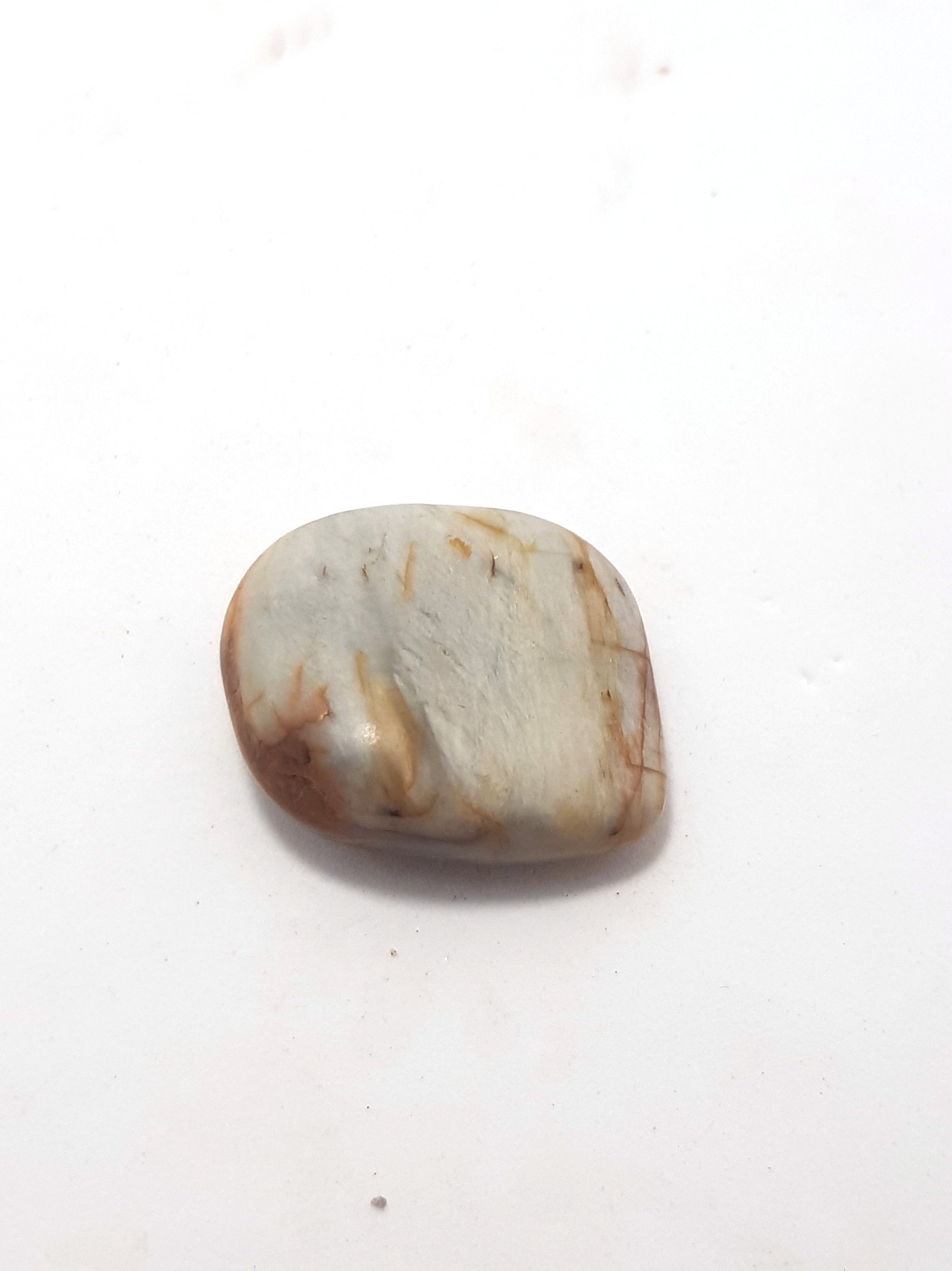 polished pebble of sillimanite