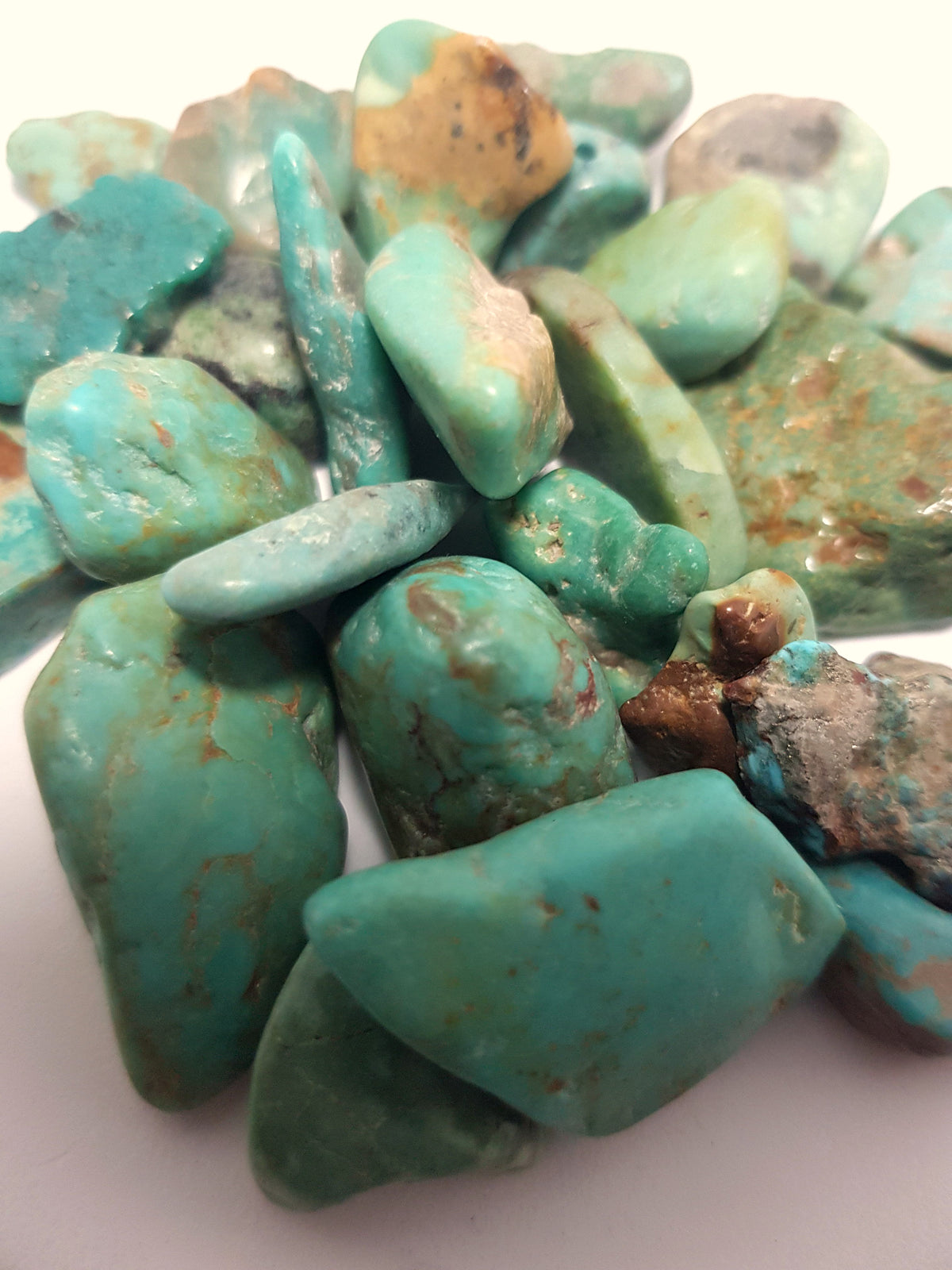 turquoise tumbles. These are irregularly shaped and a good turquoise colour