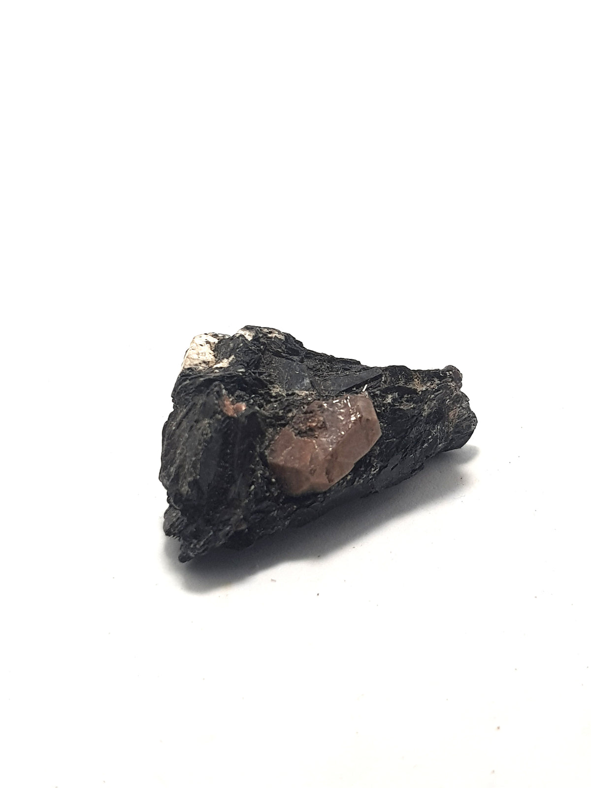 well formed zircon crystal in biotite